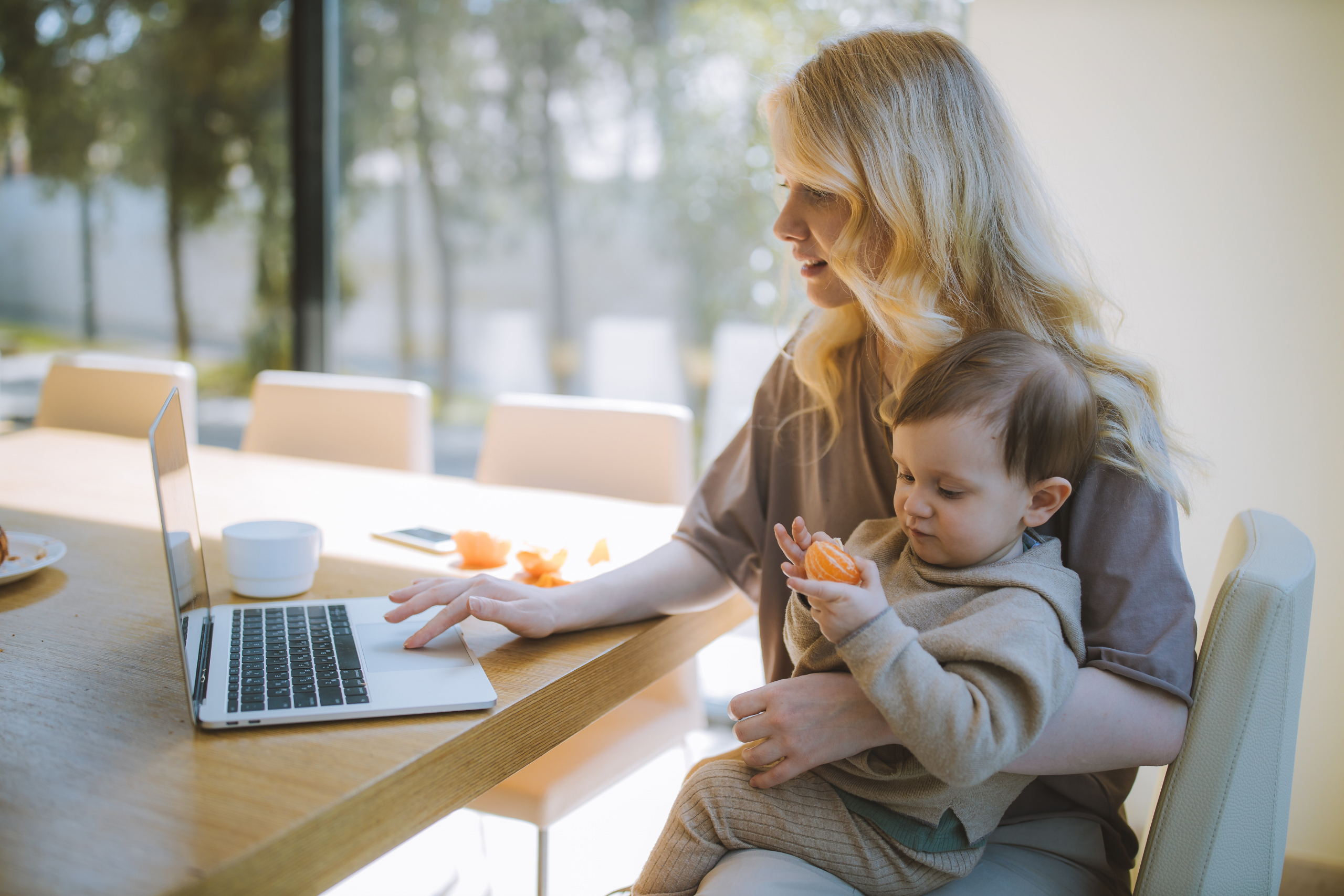 mother and child at a laptop