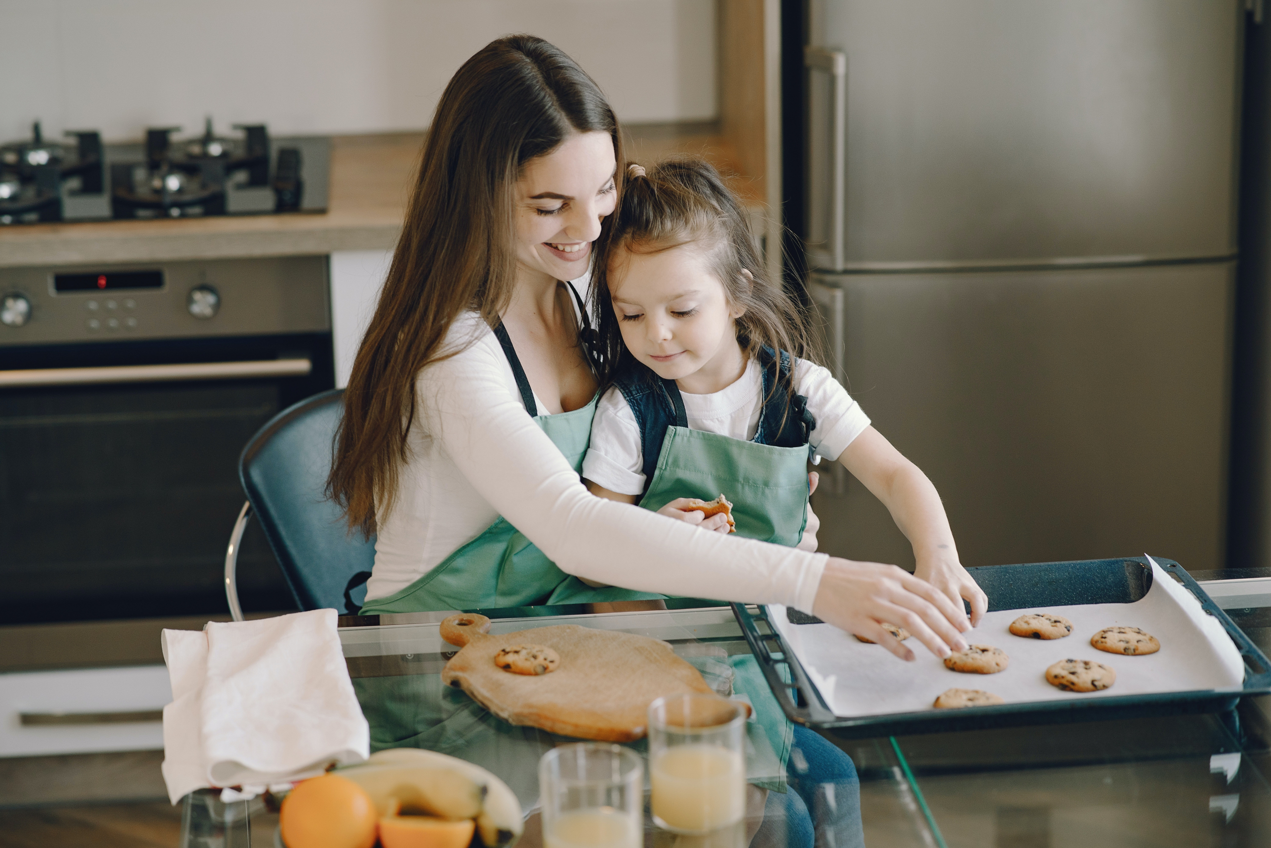 mother and child cooking together